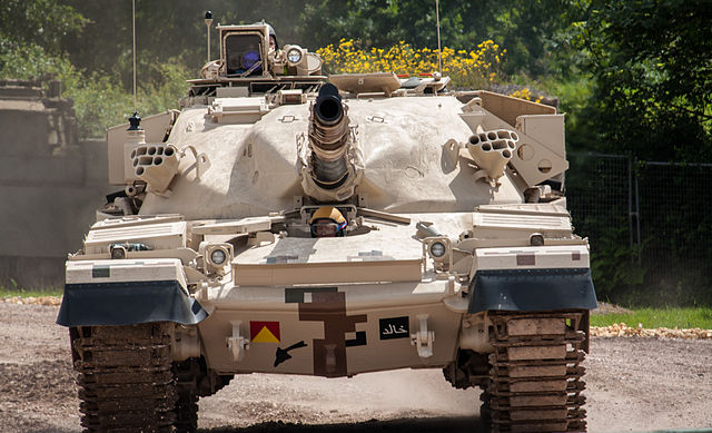 Close-up image of a Khalid with driver's head poking up