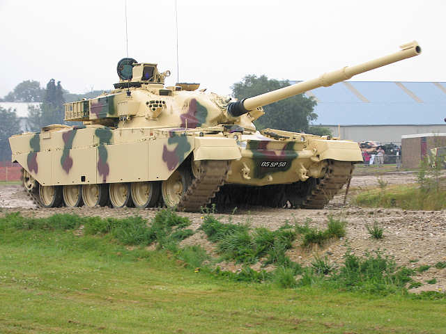 Image of a Shir 1 driving on a raised road in Bovington